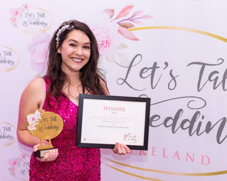 Hypnotist Sarah-Jane pictured winning her award - Newcomer of the Year 2026 - Let's Talk Weddings Ireland